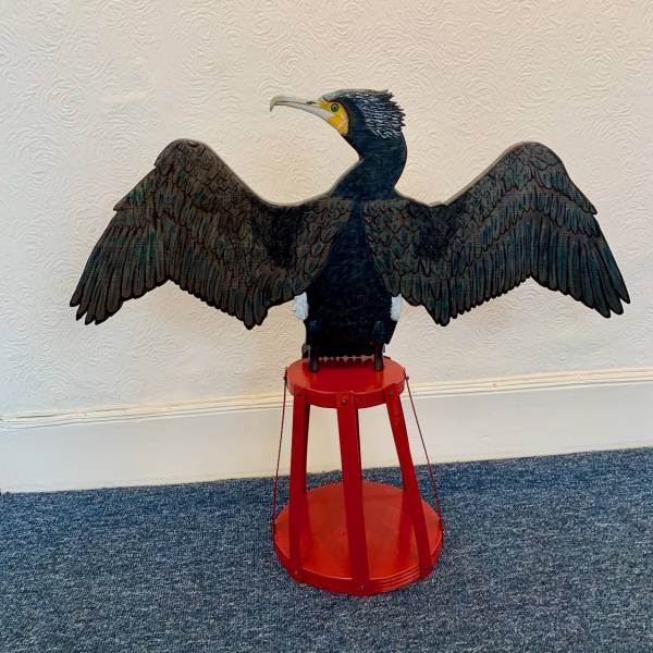 - a , wood Sculpture by John Comley, measuring 70 x 81 cm (H x W) £350